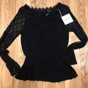 Kittenish top. New with tags.